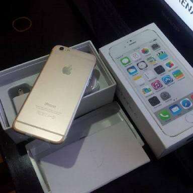 an apple iphone sitting inside of a box.