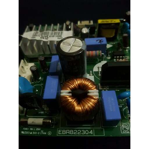 the motherboard of the computer is covered in wires.