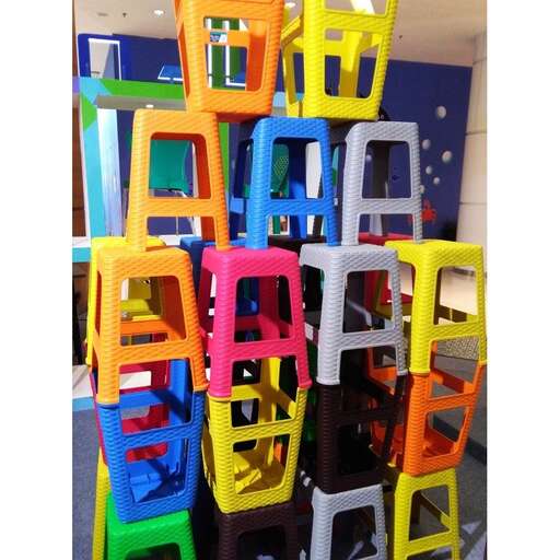 a stack of chairs made from recycled plastic.