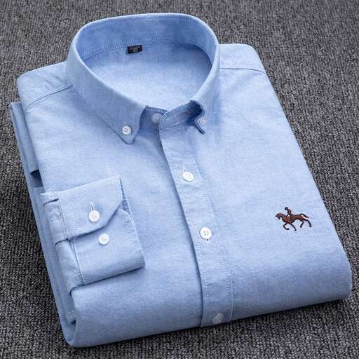 a blue shirt with a horse on the collar.