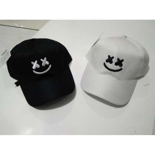 a hat with a smiley face on it.