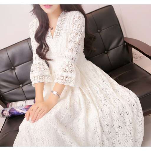 a beautiful white lace dress with a beautiful lace pattern.
