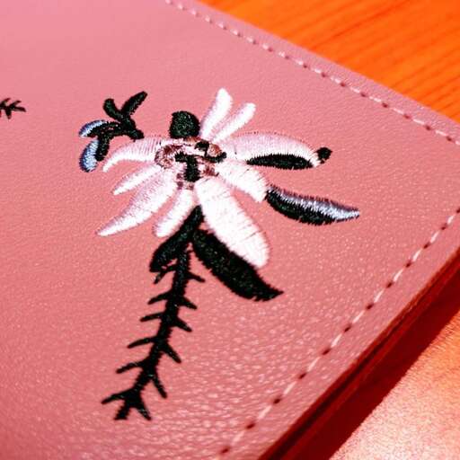 a pink flower in a pink case.