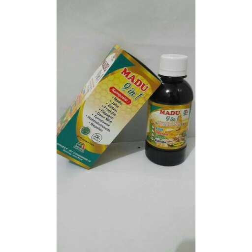 a bottle of vitamins is sitting on a table.