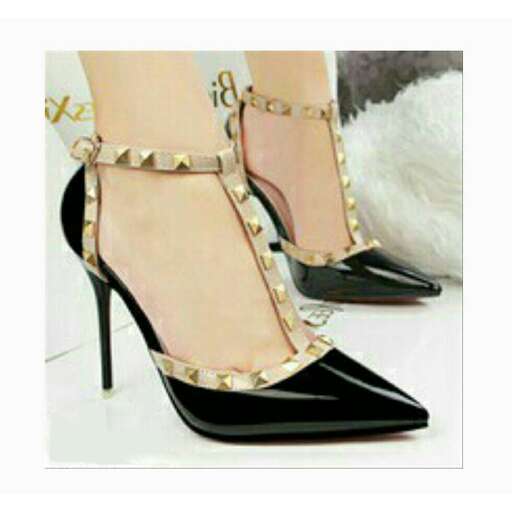 a pair of shoes with a heel