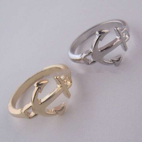 a pair of rings with a diamond