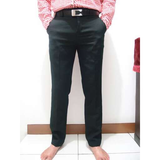 a pair of black jeans with a red and white checkered shirt.