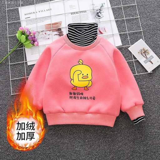 a little girl's sweater with a bird on it.