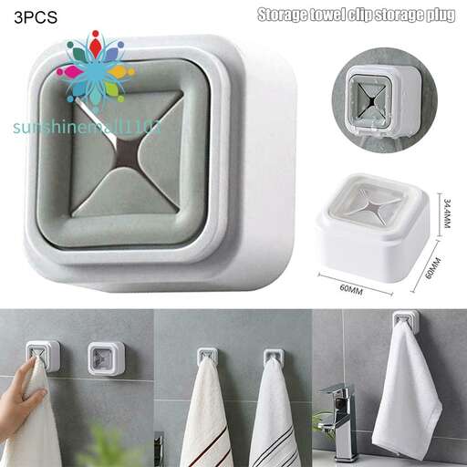 a white and gray bathroom with a white and black design.