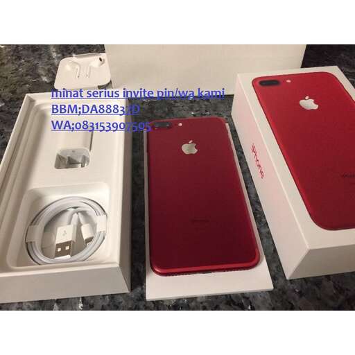 a red phone and a white sink in a white box.