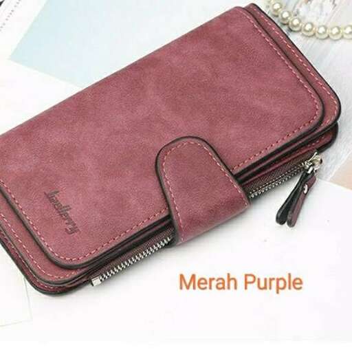 a beautiful leather wallet with a zipper.