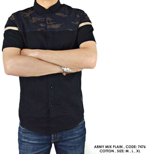 a man with his arms crossed