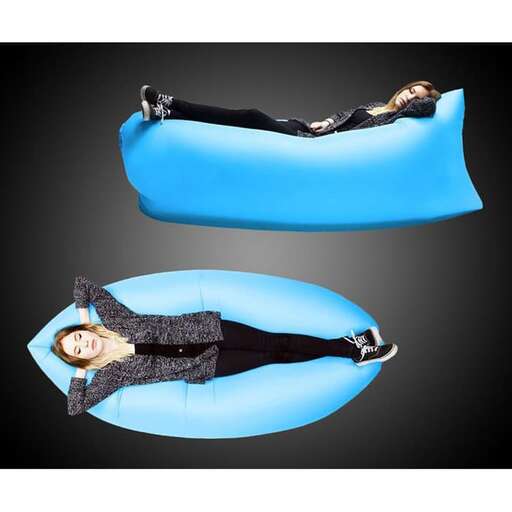 a woman lying on a blue bean bag