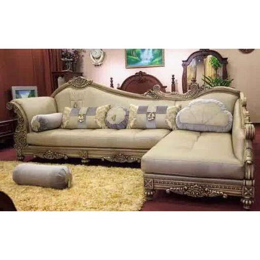 a living room with a couch and a mirror