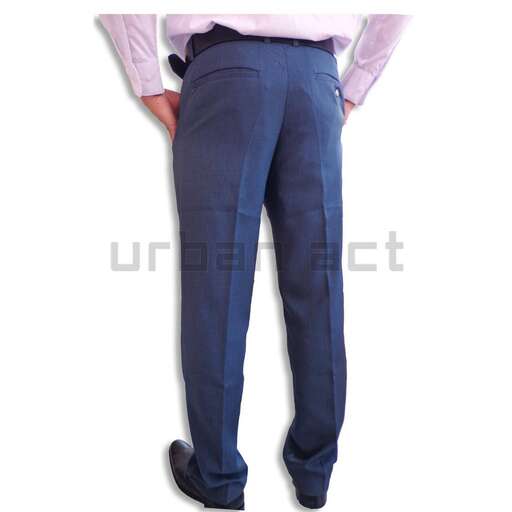 a man in a pink shirt and blue jeans.