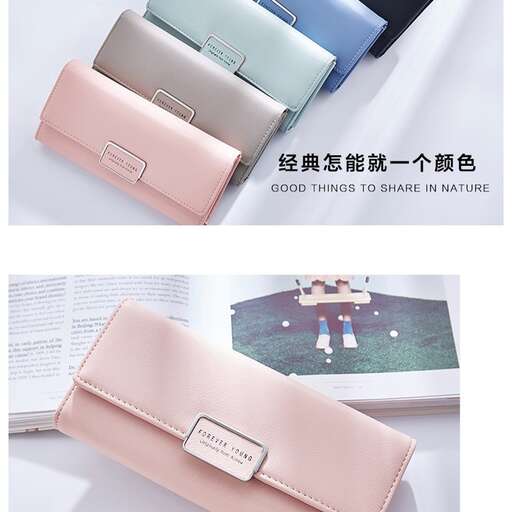 a small wallet with a picture of a baseball field and a baseball field.