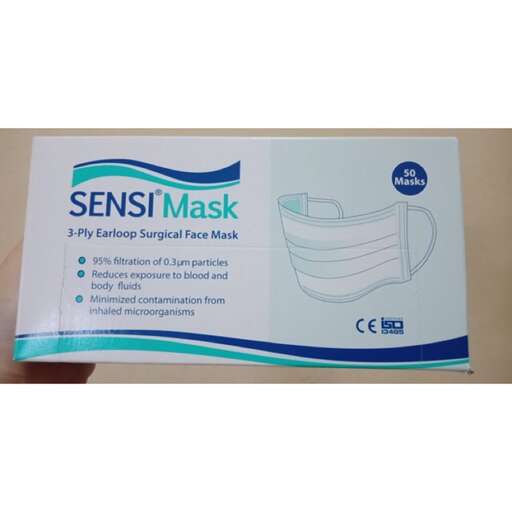 a package of a toothbrush, a toothbrush, and a tube.