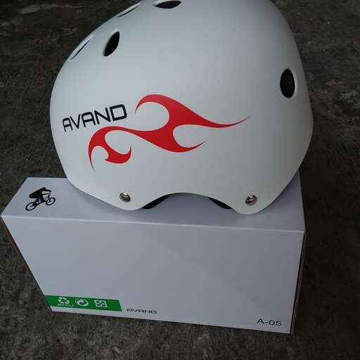 a white helmet with a red logo on it.