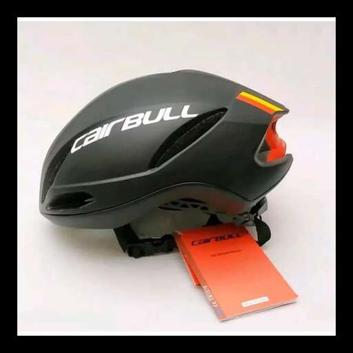 a black helmet with a orange tag on it.