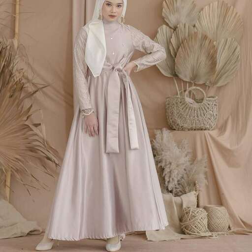 a woman in a long dress