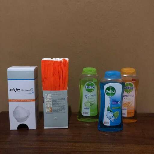 a table with several different types of toothbrushes on it.