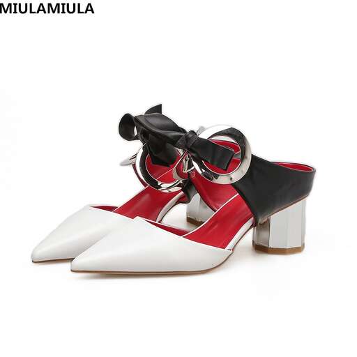 a pair of shoes that are made of leather and are designed to look like a shoe.