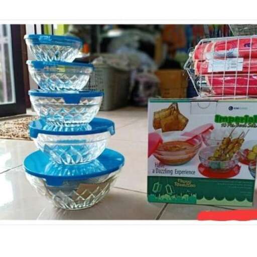 a stack of glass bowls on a table.