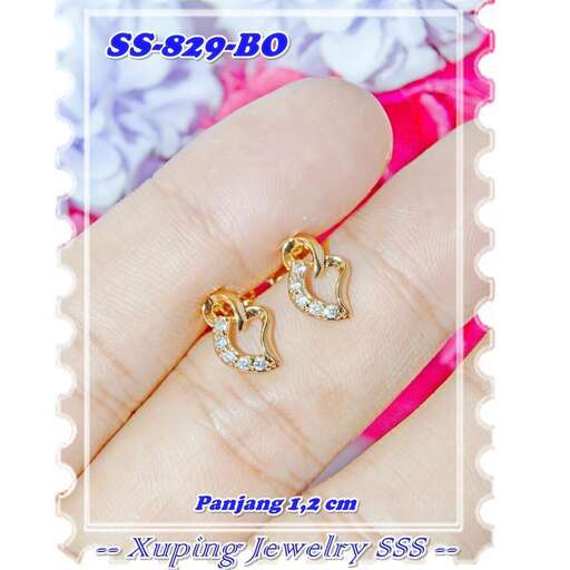 18k gold ring with heart shaped pendant in 14k gold with a red heart shaped chain.