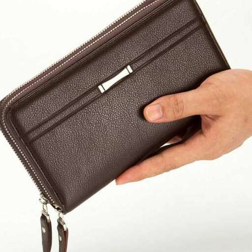wallet in a hand, leather