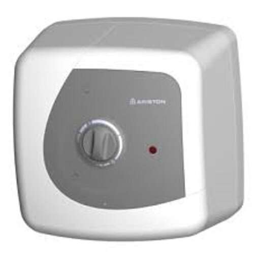 a white and red alarm clock with a dial.