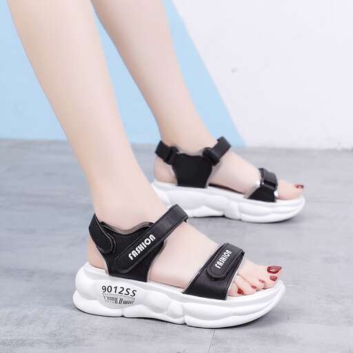 sandals with a red manicure