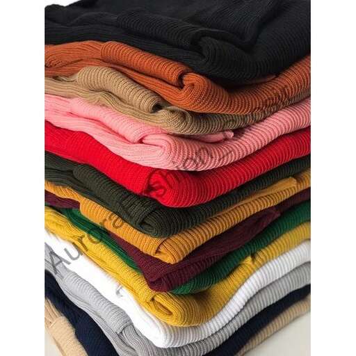 a stack of colorful folded clothing.