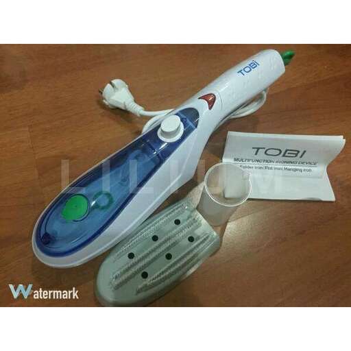 a toothbrush with a toothbrush on a table.