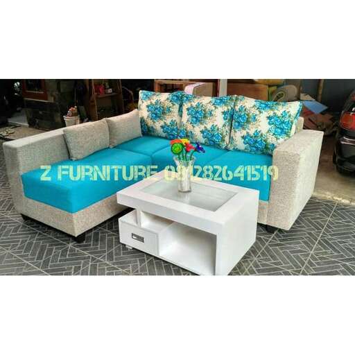 a living room with a coffee table and a coffee table