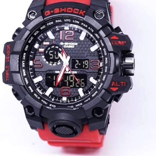 the watch is made of plastic and the black case is made from a red leather strap.