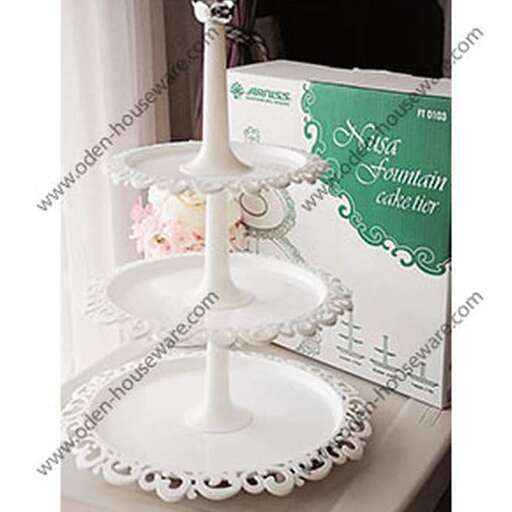 a cake stand with a white cake stand.