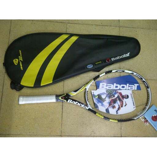 a tennis racket and a tennis racket on the ground.