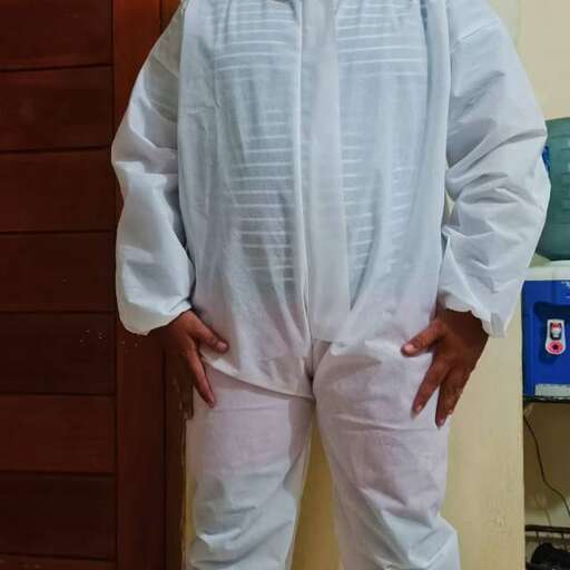 a man in white pants and a white shirt.