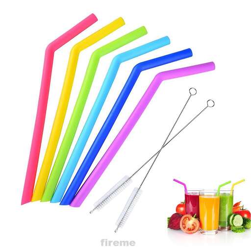 rainbow colored straws and a measuring spoon