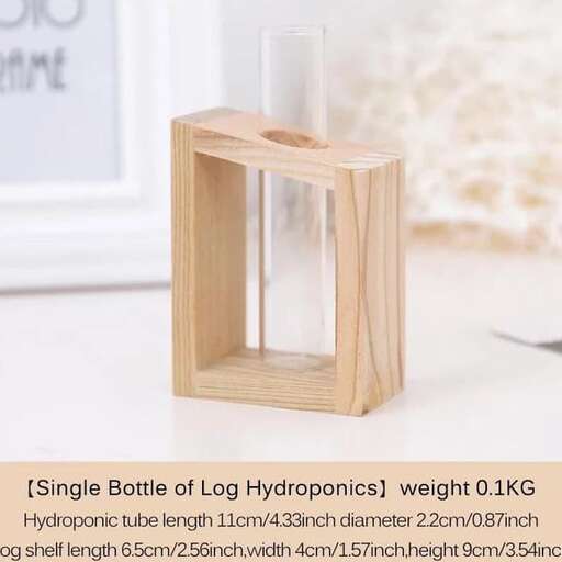 a wooden cube with a glass candle inside.