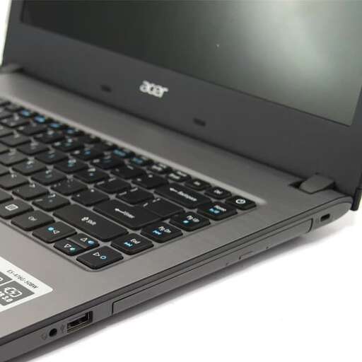 a laptop computer with a black keyboard.