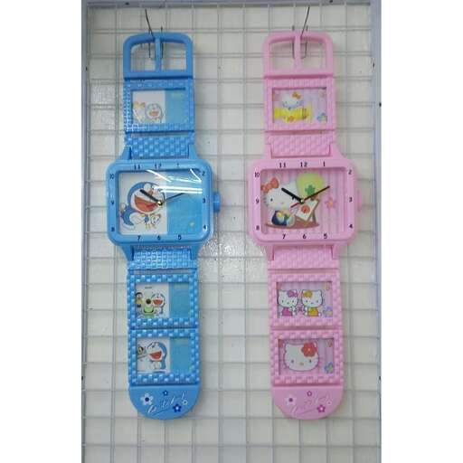 two colorful plastic toys hanging on a wall.