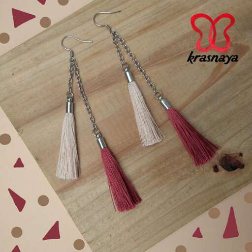 red and pink glass beads in a sterling silver chain.