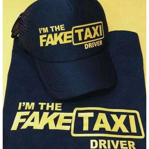 taxi driver in a hat and sunglasses