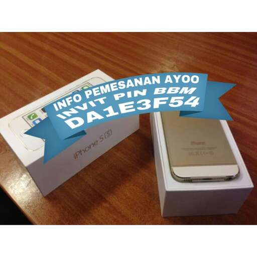 a white box with a blue ribbon on it.