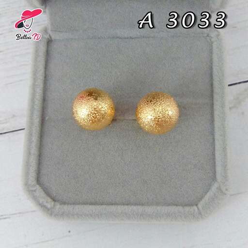 gold balls in a box