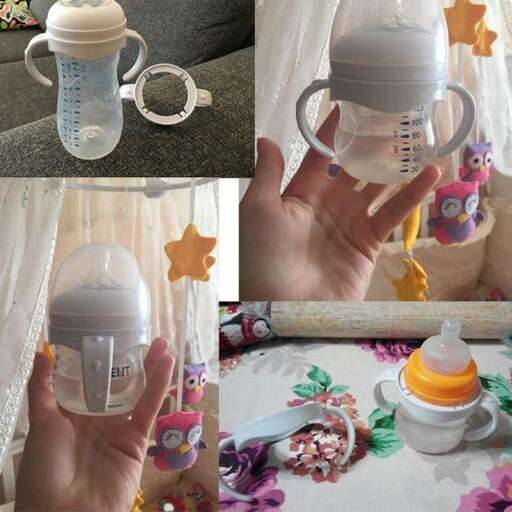 a baby bottle and a baby bottle on a table.