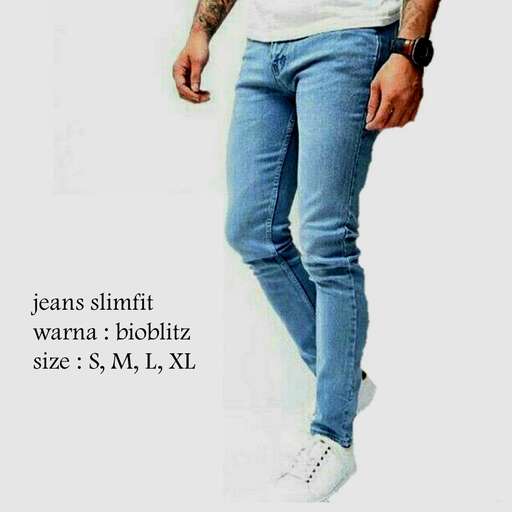 a man with a white shirt and jeans