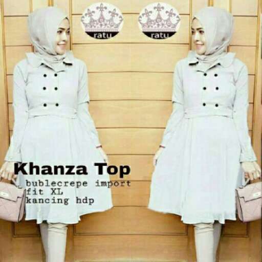 the dress is white with a black bow.