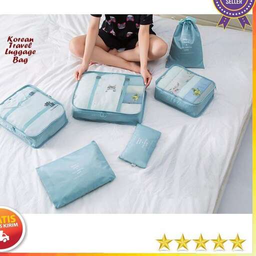 a bag that is sitting on a bed.